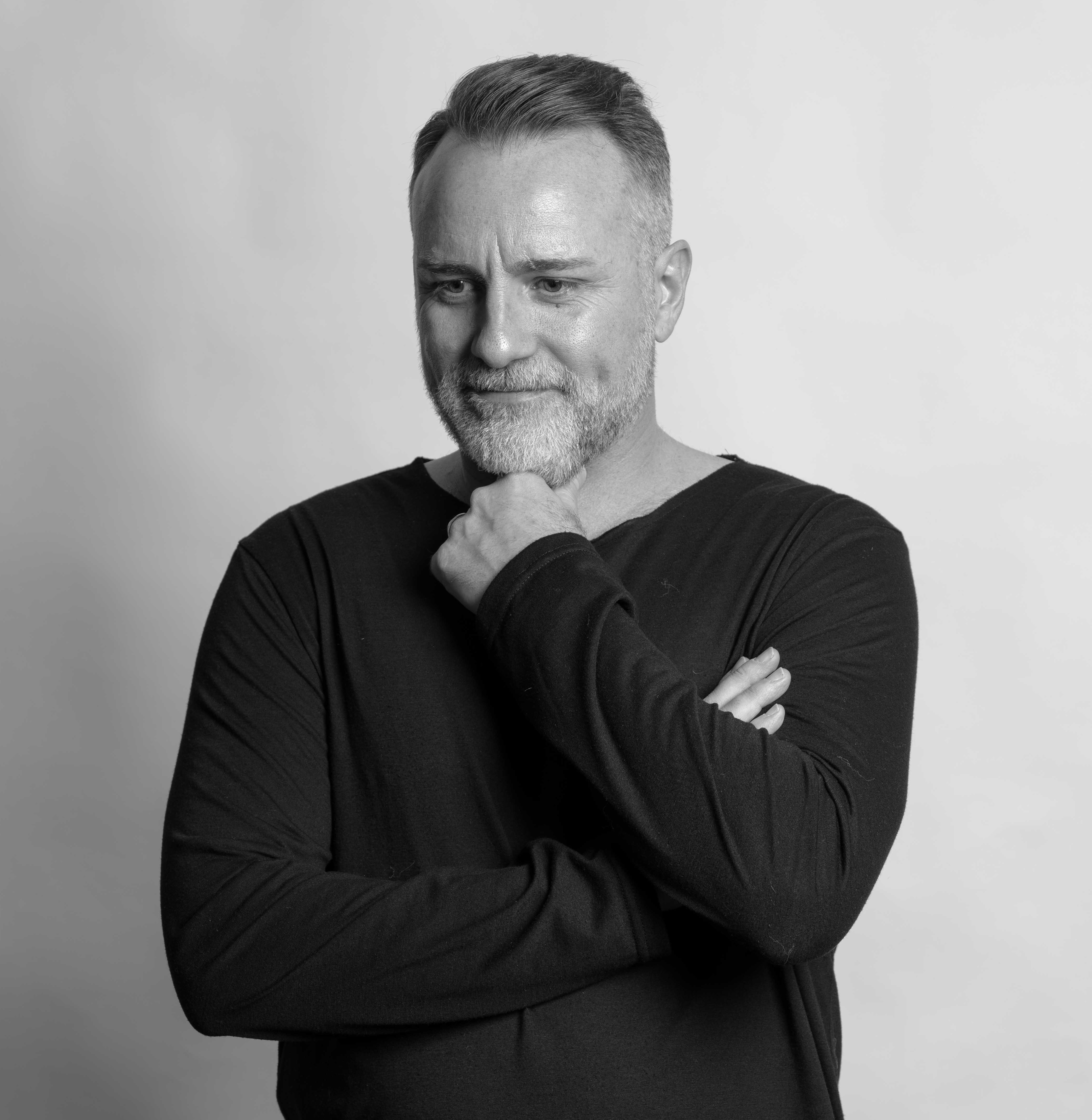 Black-and-white portrait of Mark Stevens